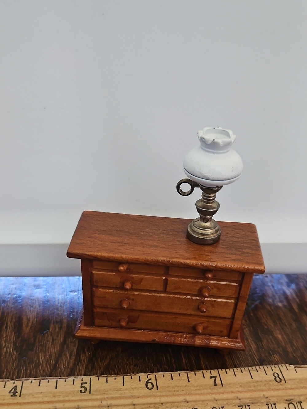 Miniature Wooden Chest of Drawers with White Oil Lamp Accent
